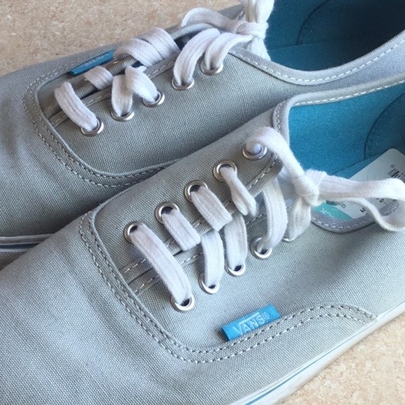 turquoise and grey vans